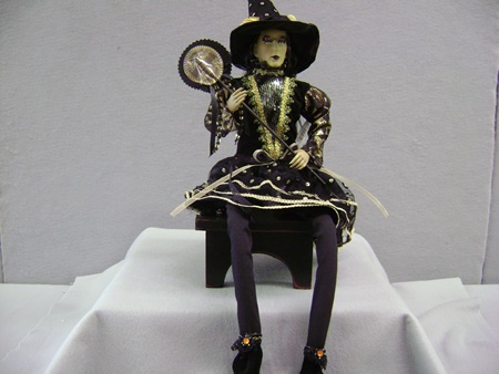 KK-41288A Clara Sitting Witch with Black and Gold Dress
